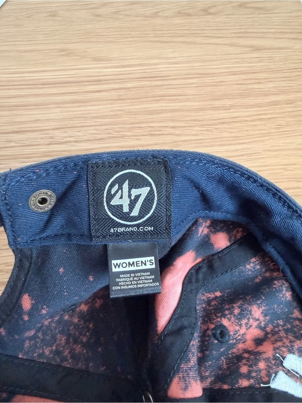 Genuine Merchandise Navy and Orange Bleach-Effect Cap